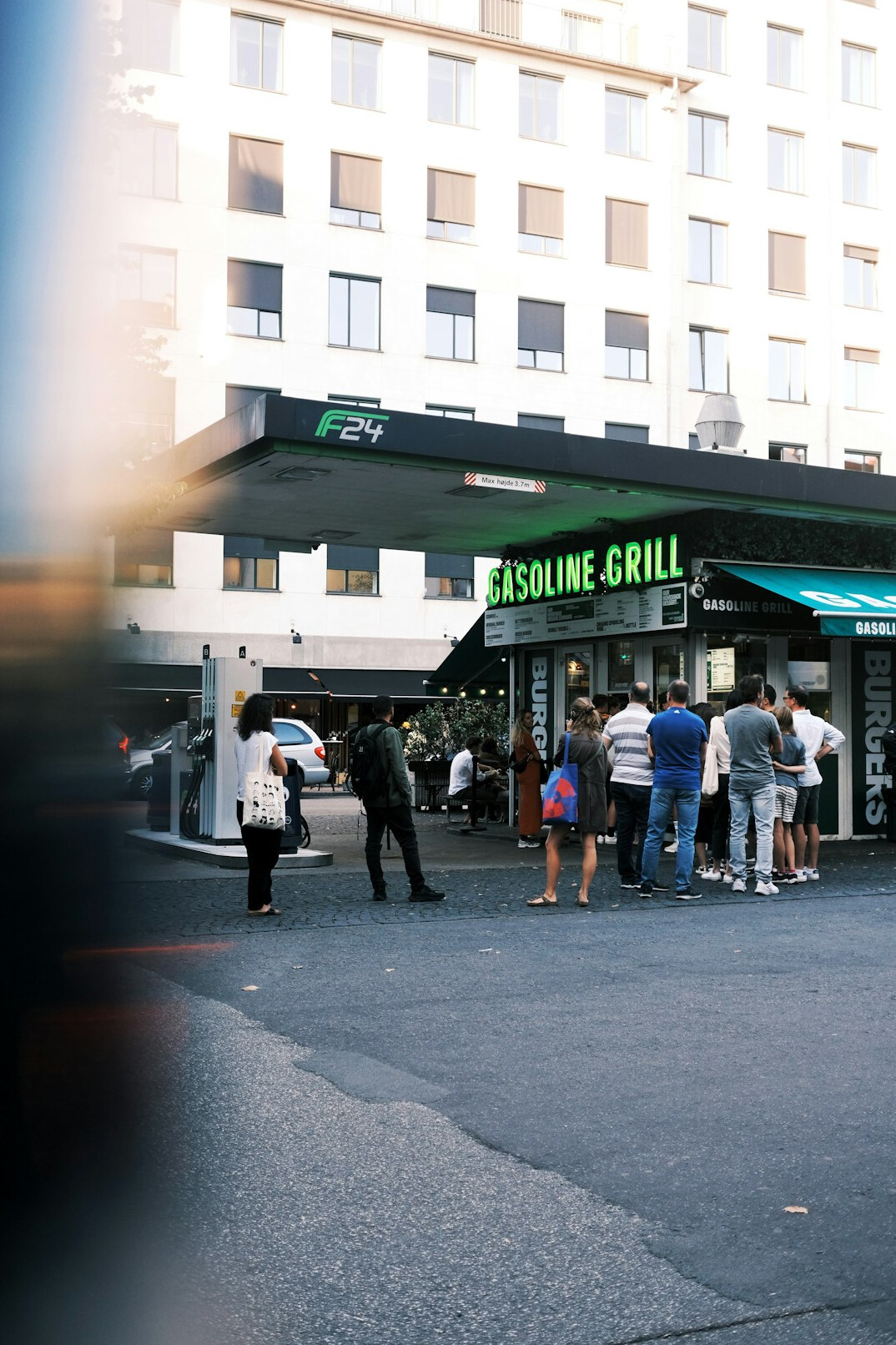 People queuing outside a small Danish bakery in the morning